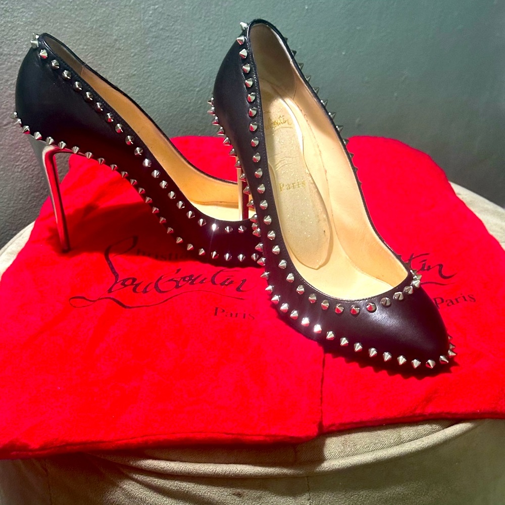 Studded Christian Louboutin Black leather pump